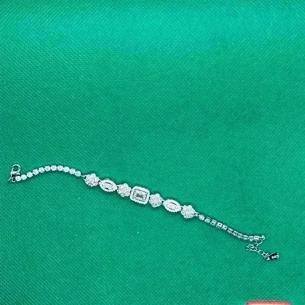 Cubic zirconia bracelet in halo mounting.